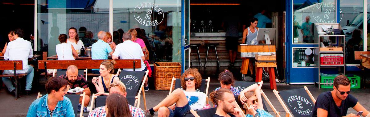 People sitting outside at Kødbyen